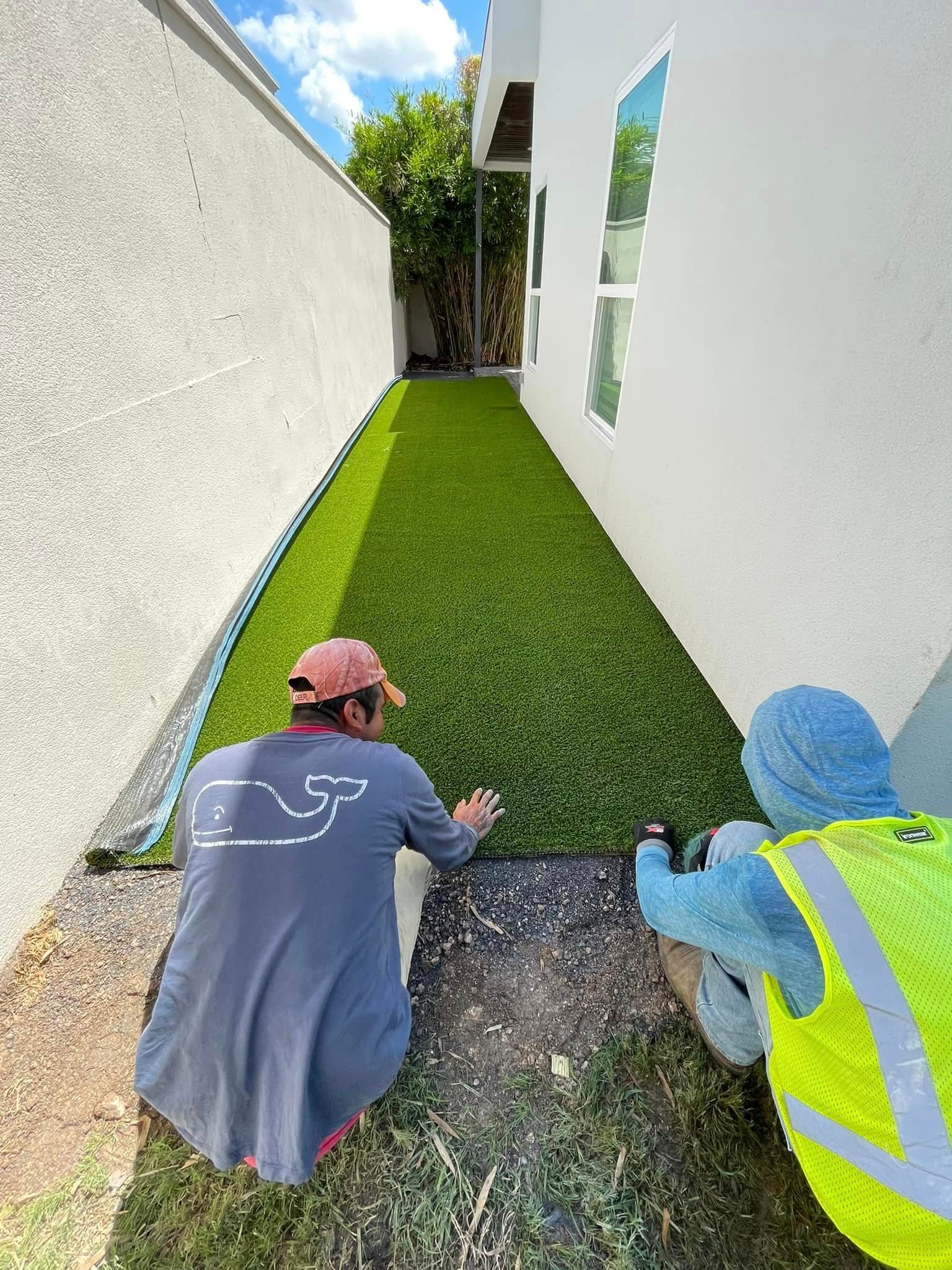 Premium artificial turf installed along a residential side yard